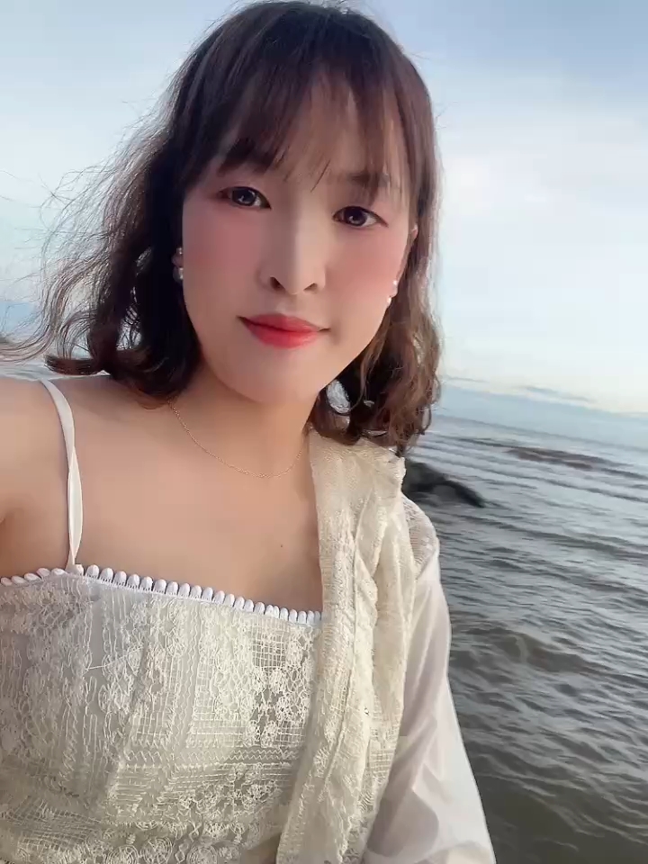Woman saying hello on a video preview