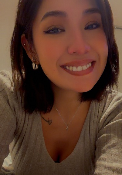 Woman smiling on a live cam chat preview