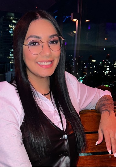 Girl with glasses smiling on a live video chat profile